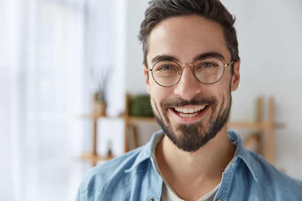 Portrait of a smiling man - Dental Bridge in Georgina, ON