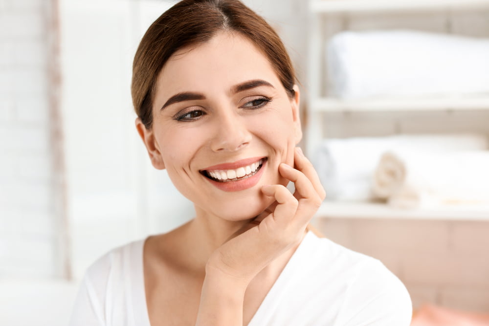 woman with beautiful smile - Dental Implants in Georgina, ON